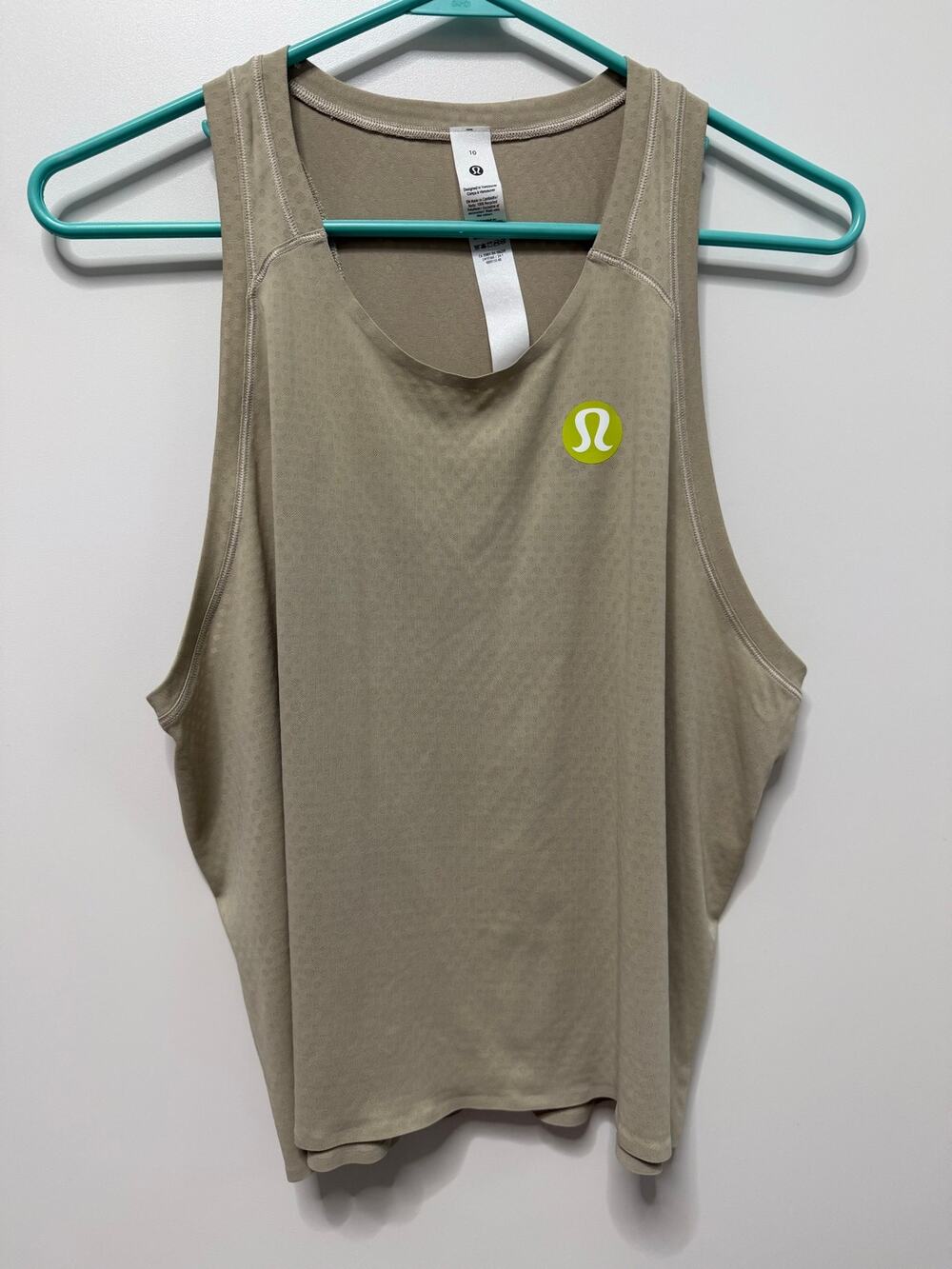 Lululemon size 10 NWOT beige tan sleeveless tank top neon yellow logo